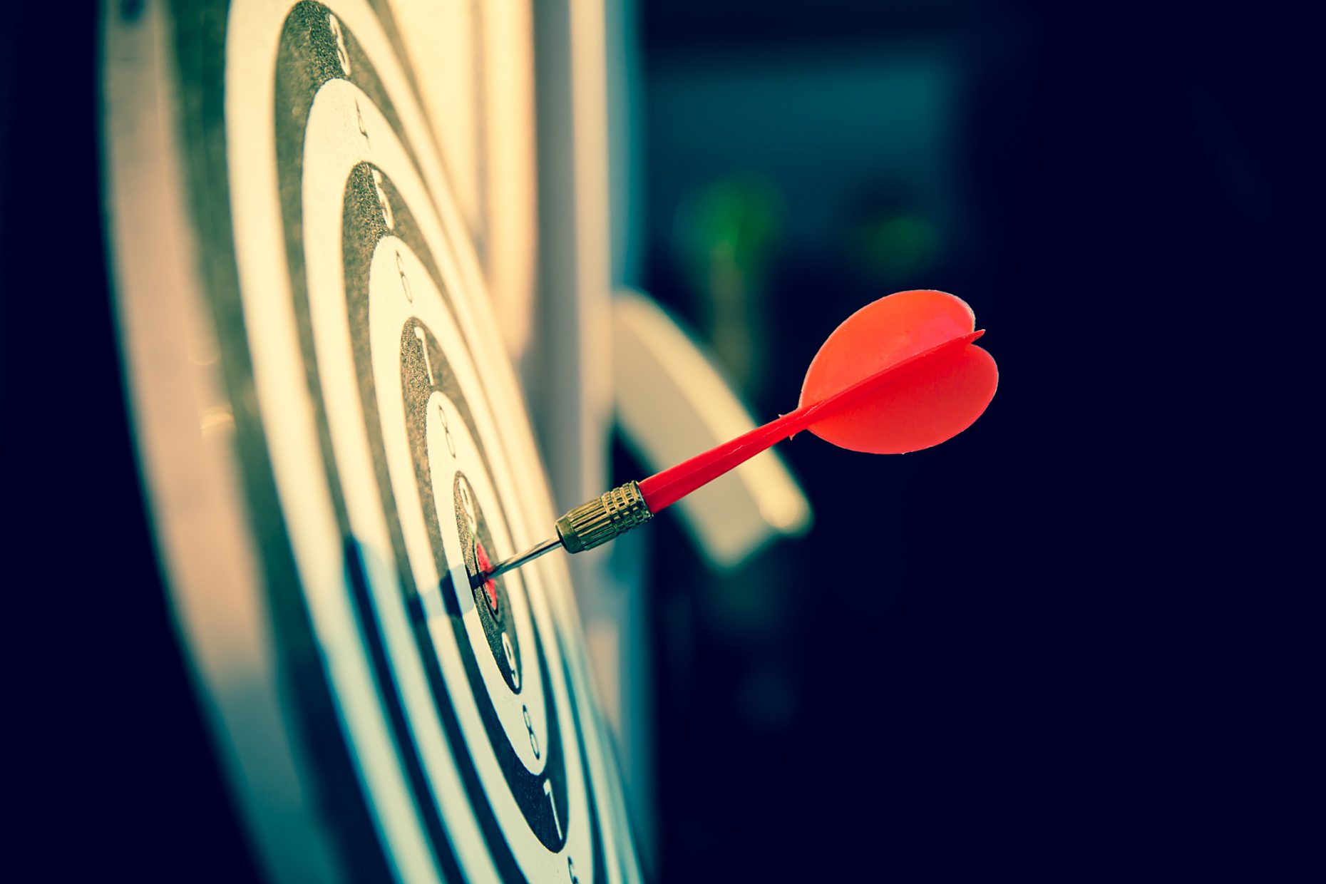 lose up a red color arrow in the center of Bullseye or bull's-eye for business targeting and good success.