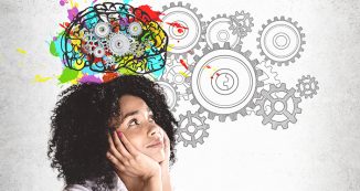 Thoughtful young African woman brainstorming