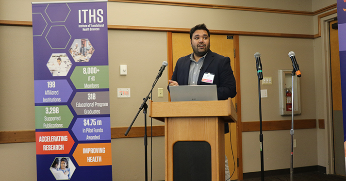 Aman Garg speaking at a podium during the 2025 ITHS expo